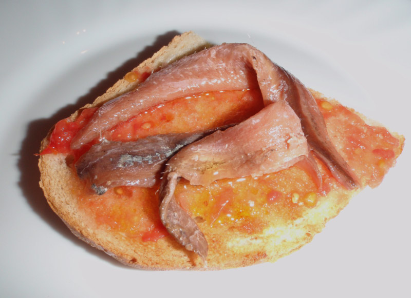 Receta de tosta de anchoas del Cantábrico